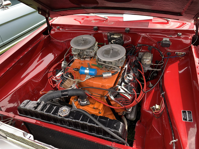 Cross-ram 426 Hemi in a Dart. This was basically a factory drag car